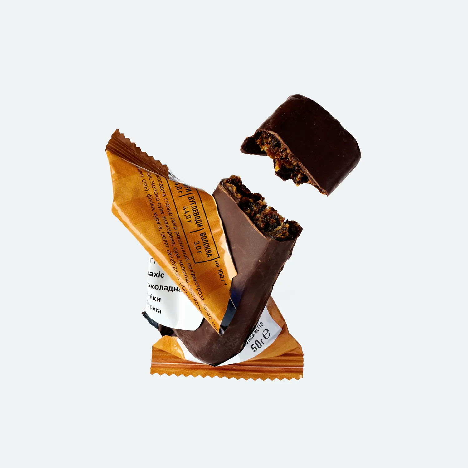 Батончик з CBD "Арахіс та курага" в шоколадній глазурі, 50 г. Батончик з CBD "Арахіс та курага" в шоколадній глазурі, 50 г.